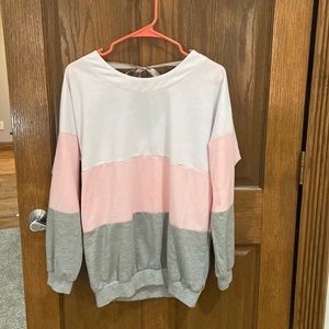 Woman’s tie in back sweater